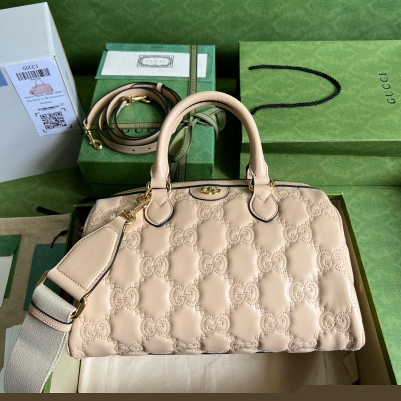 G*u*i top handle bags